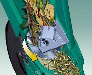 systeme de coupe disque plateau tournant porte lame d'un broyeur de végétaux